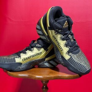 Adidas Black and Gold Performance Sneakers